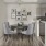 a kitchen with a dining table and chairs