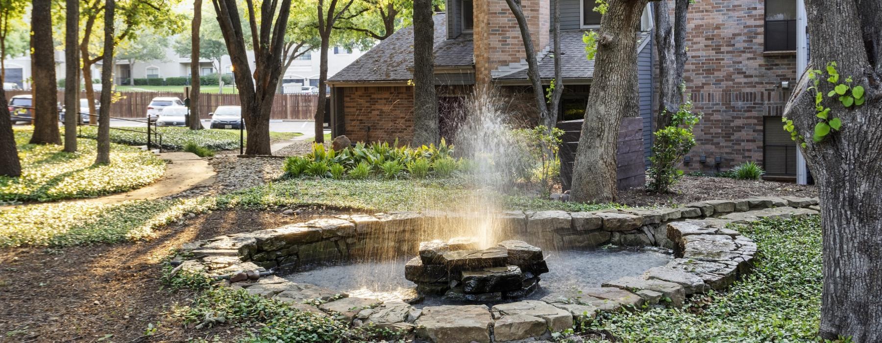 a fountain in a yard